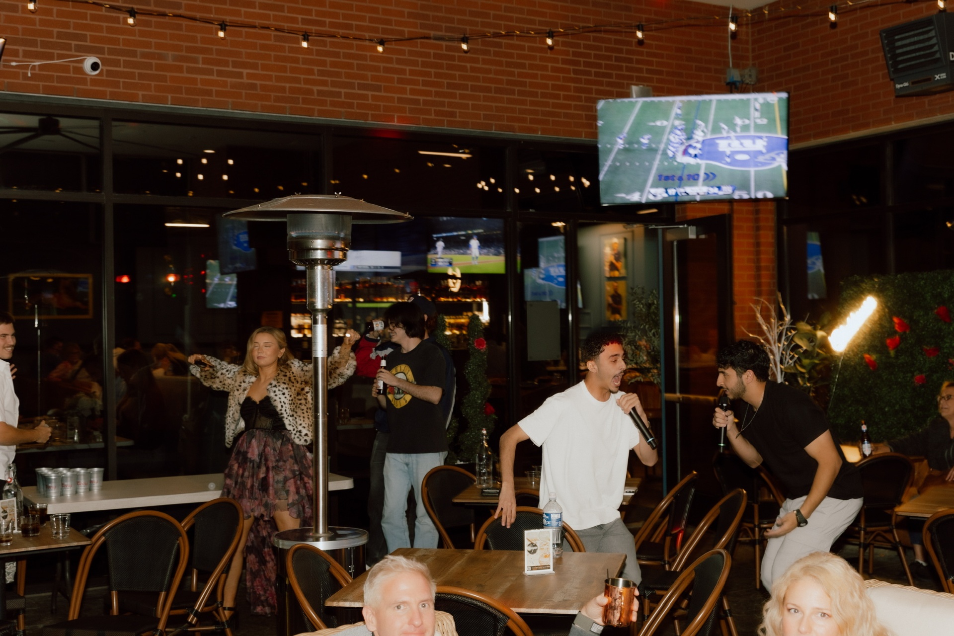Karaoke night on the Clubhouse patio