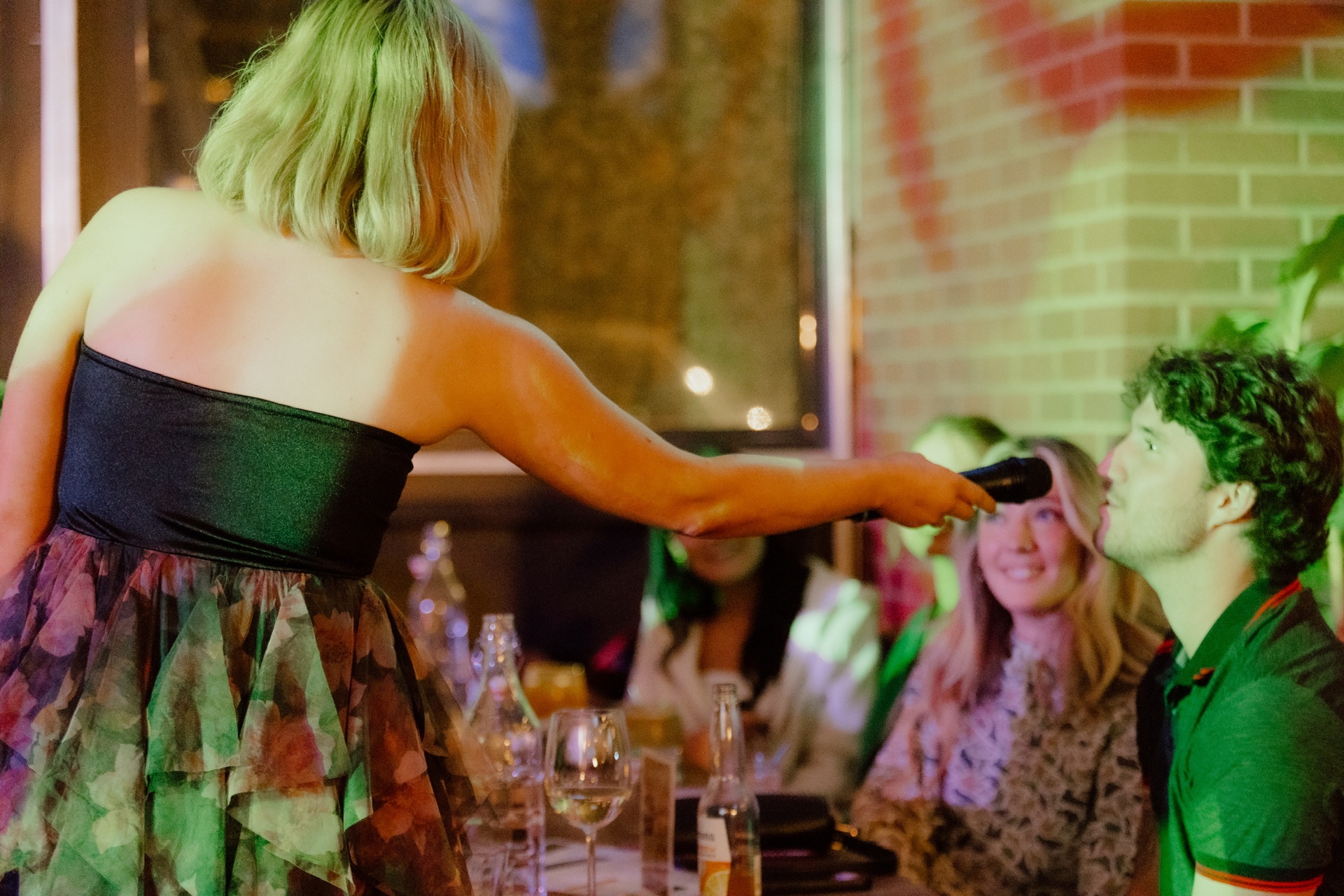 Singer performing karaoke at Clubhouse
