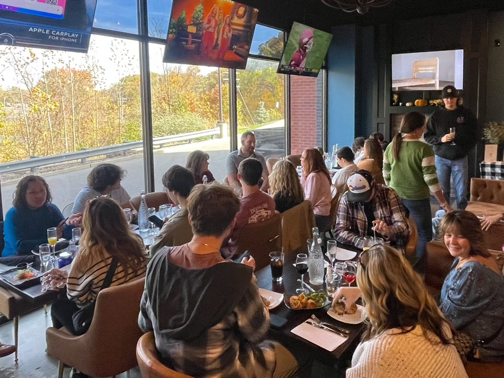 Private party group dining at The Clubhouse with games on the TVs